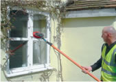 Cleaning windows with a water fed pole